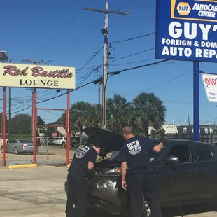 Getting a squirrel out from under my hood. They were definitely troopers and made sure the squirrel was ok.