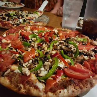 Large Sausage, Pepperoni, Mushroom,  Cashew, Tomato, &amp; Bell Pepper Pizza