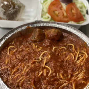 Spaghetti with 2 homemade meatballs plus a tossed salad $10.95