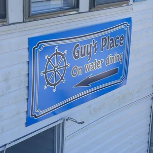 a sign on the side of a building