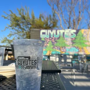 Rooftop patio, collectible cups, and a beautiful Sean Vali mural.