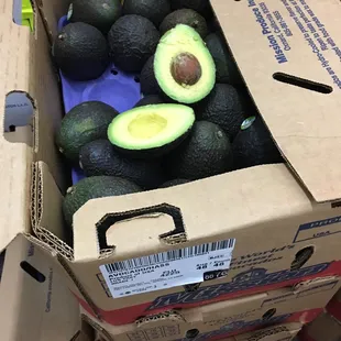 avocados in a cardboard box
