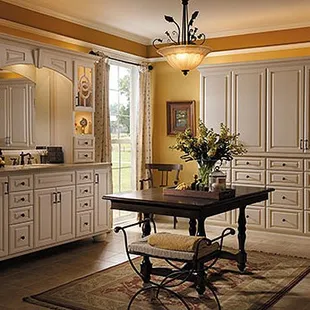 a kitchen with white cabinets