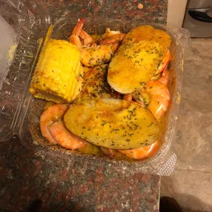 Jumbo shrimp plate, I ordered sides of corn and potatoes. All about $13. Their food is always amazing.