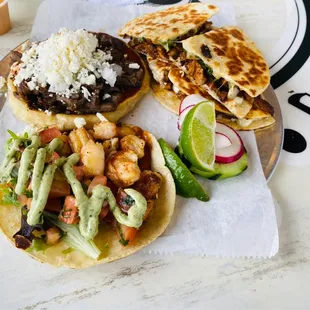 Al Pastor Gringa, Gym Taco, and Red Sopes with Carne Asada