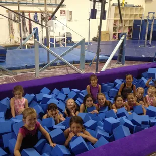 Having fun in the foam pit.