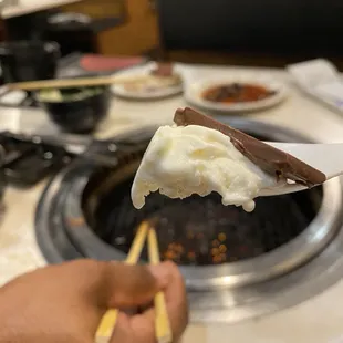 We grilled the chocolate (s&apos;mores, hold everything else) slightly and ate it on vanilla ice cream!