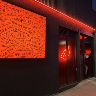 a neon sign on a building