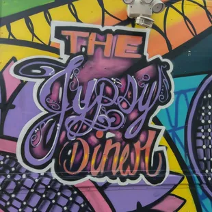 the graffiti on the side of the truck