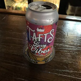 a can of beer on a table