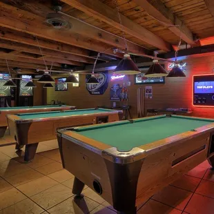 a pool table and arcade