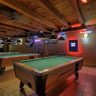 a pool table and arcade