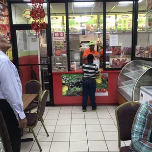a man standing in front of the counter
