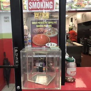 a no smoking sign in a store