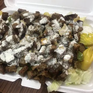 Gyro Meat and Yogurt Sauce over Salad ($10)