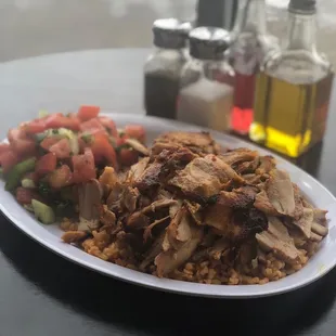 Chicken Gyro served with bulgur wheat and salad