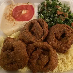a meal in a styrofoam container