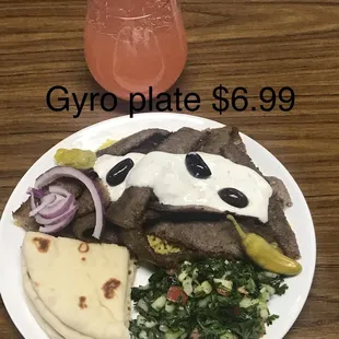 a plate of food and a drink