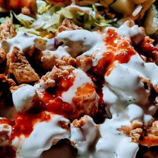 Chicken on a bed of saffron rice and salad. Glorious!