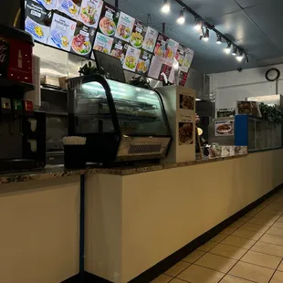 a view of a restaurant counter