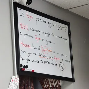 a white board with writing on it