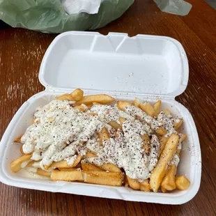 french fries in a styrofoam container