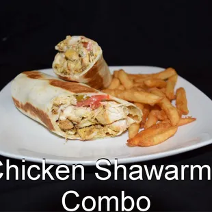 Chicken Shawarma Combo - Marinated chicken chopped up wrapped in a flour tortilla with tomatoes, garlic sauce, and Arabic pickle with fries.