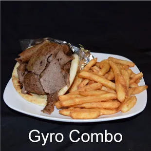 Gyro Combo - Tender slices of beef and lamb in spice served on our pita bread with lettuce, tomatoes, red onions and a side of fries.