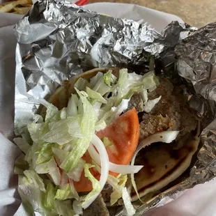 Original gyro and side of fries with cheese sauce