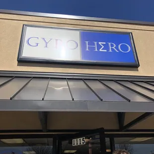 a woman walking in front of a store
