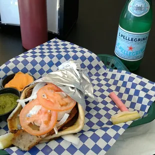 Gyro with sides of shug sauce and harissa sauce. That shug sauce could be addictive.....