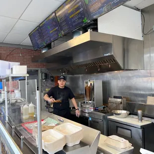 a man working in a restaurant kitchen