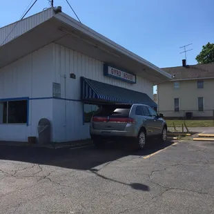 a car parked in front of a building