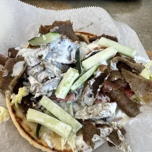 Lamb Gyro Sandwich - I had already taken several bites before I thought to take a photo. It&apos;s still loaded with meat and toppings.