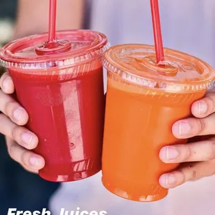 fresh juices in plastic cups