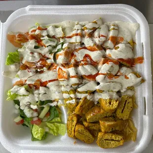 Chicken kabobs rice platter sliced