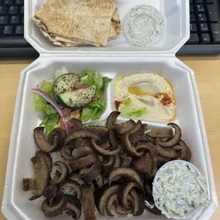 Gyro plate with hummus and tzatziki