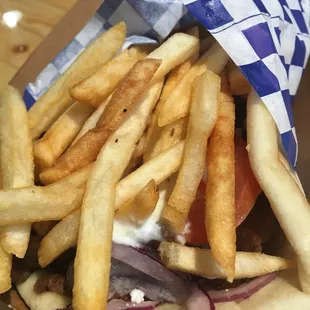 Now at Edgewater Public Market! Apparently the traditional gyro sandwich comes with the fries inside.