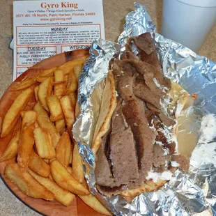 Gyro, payed extra for fries- not enough onion and tomato on gyro. Decent, but not real good.