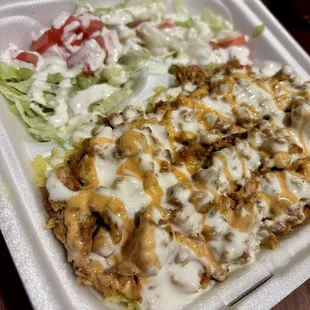 a meal in a styrofoam container