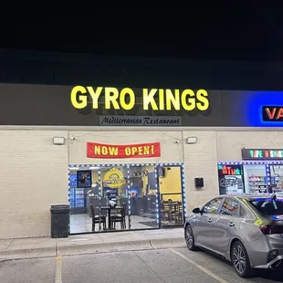 a car parked in front of a store