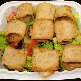 Chicken gyro over salad