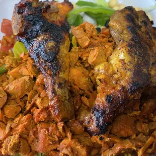 a plate of meat and vegetables