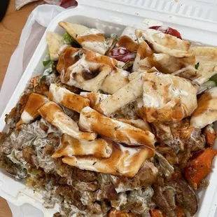 Chicken and lamb over rice (white sauce + bbq sauce)