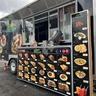 a food truck with menus