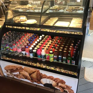 Nice drink selection below with little pastries on display.