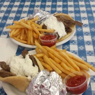 Two gyro combos. Also came with a can of soda each.