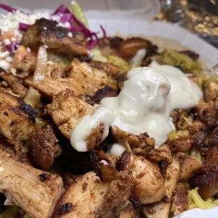 9. Shawarma Platter  Delicious, tender chicken, perfectly seasoned rice, creamy hummus, and tangy Greek salad!