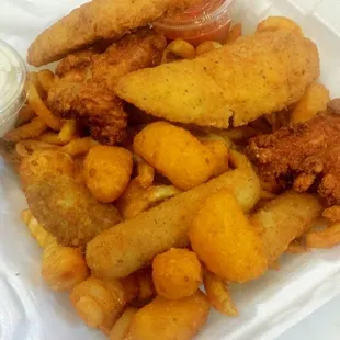 Appetizer combo include curly fries, chicken wings, chicken tenders, mozzarella sticks, poppers, cheese curds, side of ranch and marinara