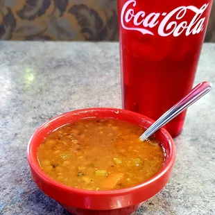 Complimentary soup  This lentil was very good. The lemon chicken contained DRY  chicken chunks... I see a pattern with their chicken.